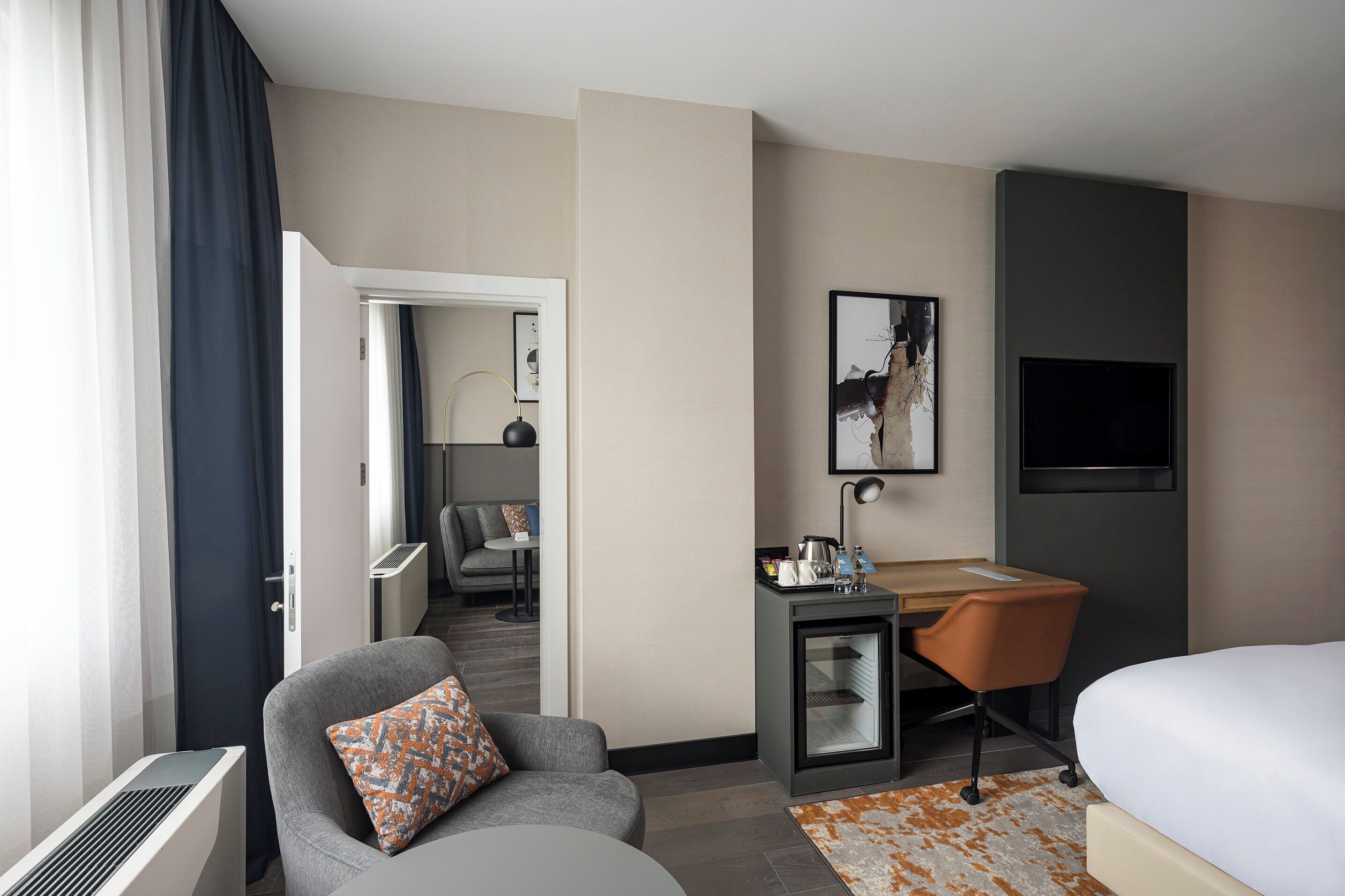 Suite Eksekutif, 1 kamar tidur | Seprai premium, brankas, dan ruang kerja ramah laptop