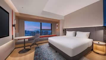 Premium bedding, down duvets, laptop workspace, blackout curtains