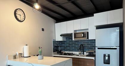 Modern double-height loft new and equipped with its own parking lot