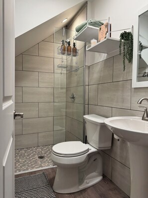 Shower, rainfall showerhead, eco-friendly toiletries, hair dryer