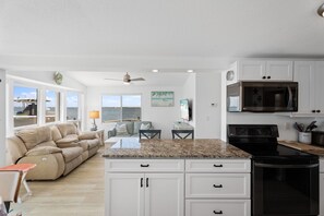 Fridge, microwave, oven, stovetop - Waterfront Stunning 2 bed 2 bath riverfront beach home on Nettles Island (Jensen Beach)