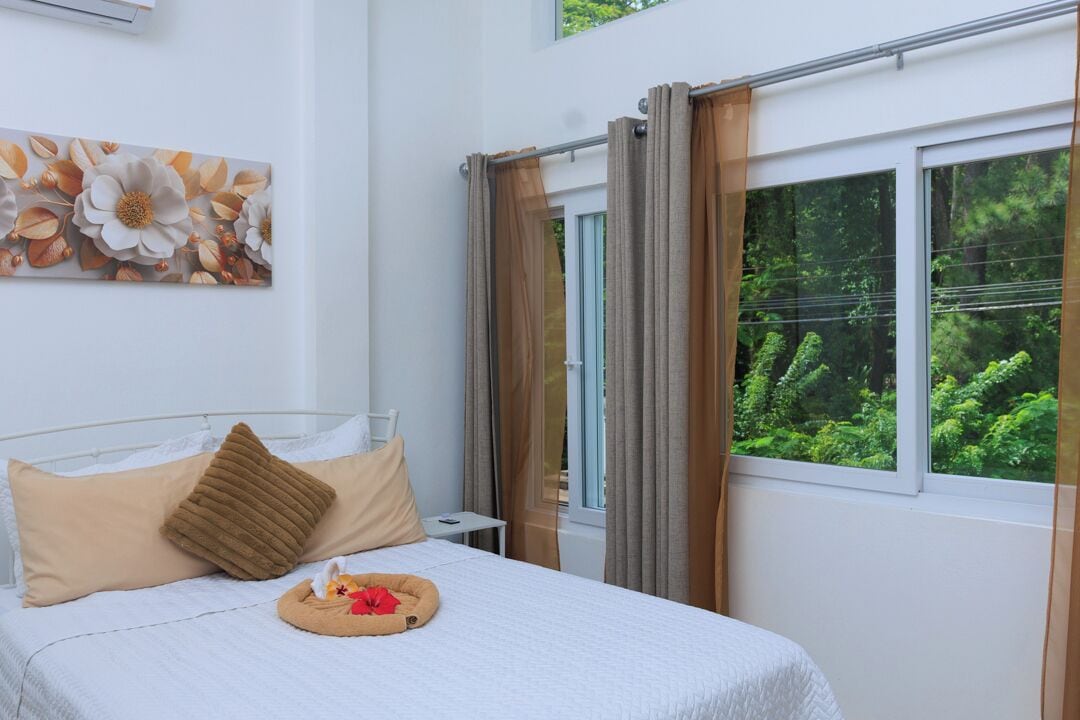 Appartement, 2 slaapkamers, uitzicht op tuin | Verduisterende gordijnen, geluiddichte muren