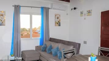 Appartement, uitzicht op tuin | Woonruimte