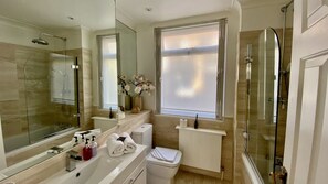 Hair dryer, towels, soap, toilet paper