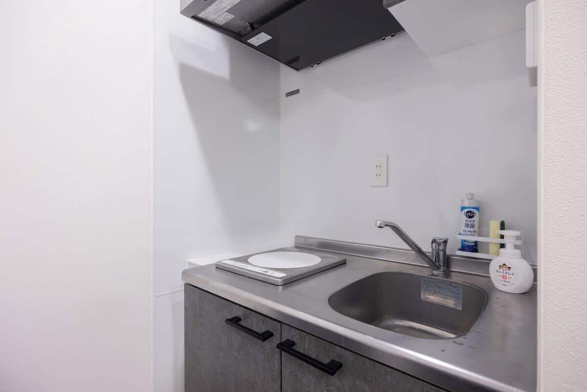 Fridge, microwave, cookware/dishes/utensils