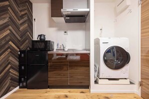 Fridge, microwave, electric kettle, cookware/dishes/utensils