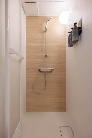 Shower, hair dryer, shampoo