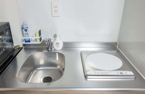 Fridge, microwave, cookware/dishes/utensils