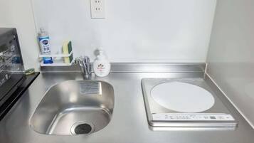 Fridge, microwave, electric kettle, cookware/dishes/utensils