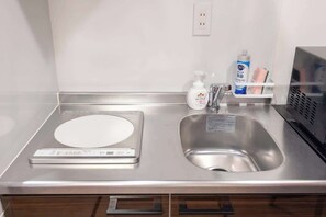 Fridge, microwave, cookware/dishes/utensils