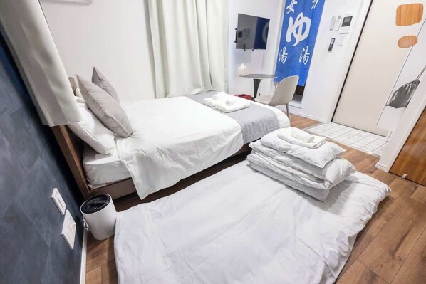 1 غرفة نوم ومكواة/لوح كي وواي فاي وملاءات أسرّة