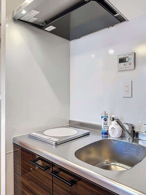 Fridge, microwave, cookware/dishes/utensils