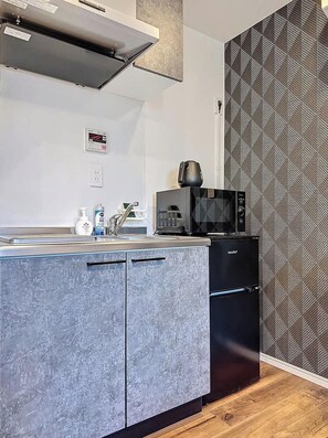Fridge, microwave, cookware/dishes/utensils