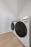 Rainfall showerhead, eco-friendly toiletries, hair dryer, towels