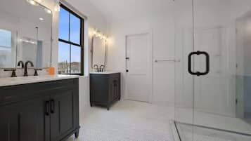 Rainfall showerhead, eco-friendly toiletries, hair dryer, towels