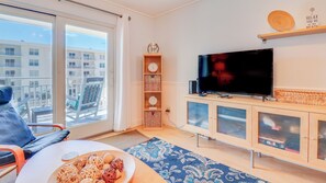Télévision, lecteur de DVD, vidéothèque