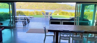 Cooks Beach - Waterfront Paradise. 
Beautiful beach home at stunning Cooks Beach