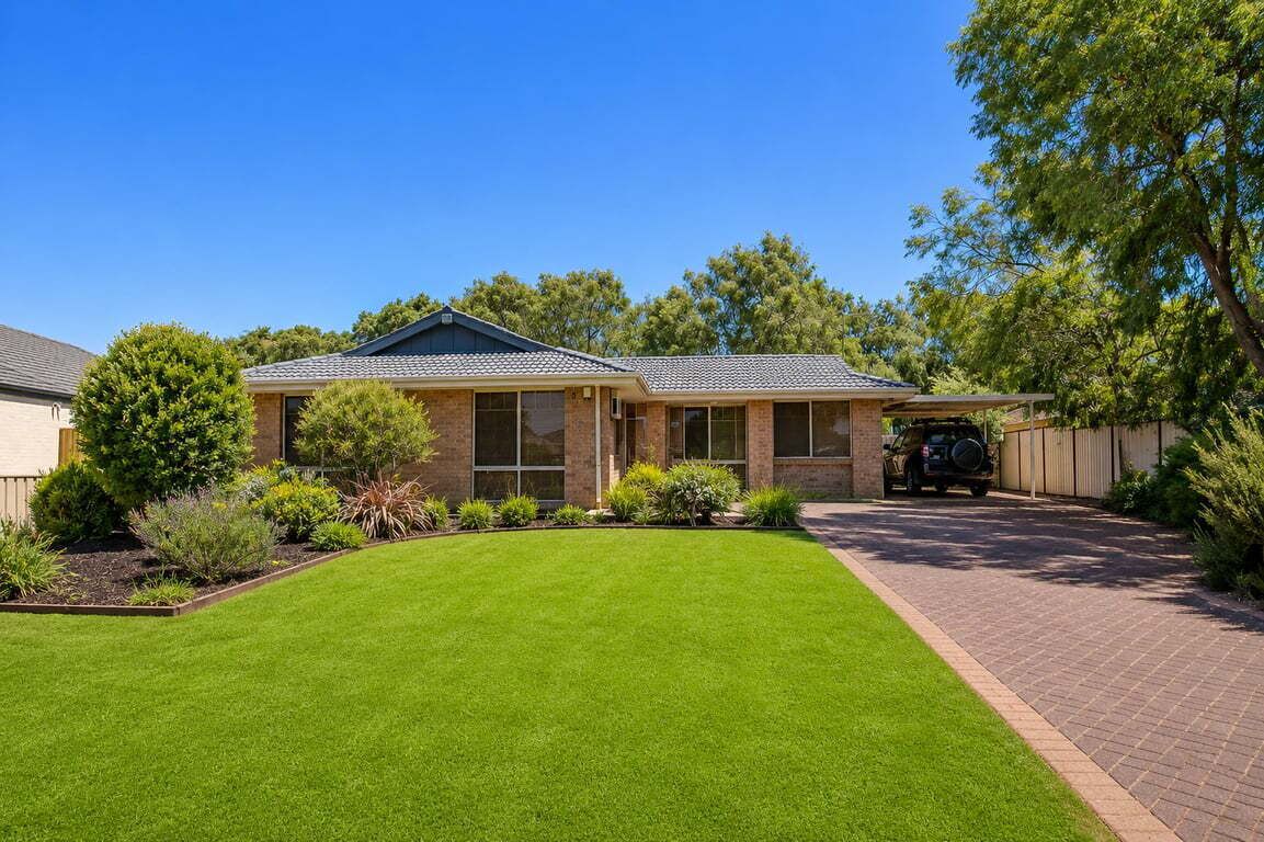 Bright suburban home with landscaped yard