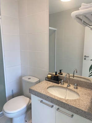 Hair dryer, towels, soap, toilet paper