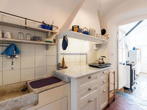 Fridge, microwave, cookware/dishes/utensils