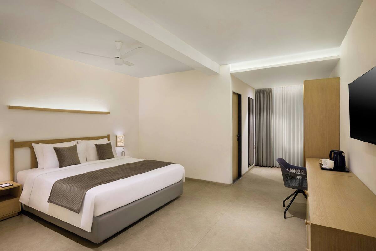 Room, 1 King Bed (View) | In-room safe, desk, laptop workspace, WiFi (free)