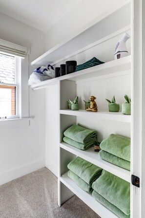 Casa Serena | Bathroom | Rainfall showerhead, eco-friendly toiletries, hair dryer, towels