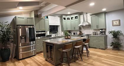 Private 4-bedroom house on large creek with serene backyard