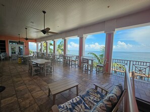 Outdoor dining - Updated Waterfront Condo, Pool + Pier, 10 Min to Beach & Downtown St. Pete (St. Petersburg)