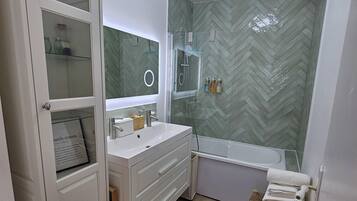 Hair dryer, towels, soap, toilet paper