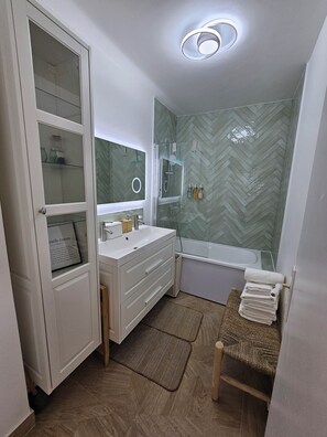 Hair dryer, towels, soap, toilet paper