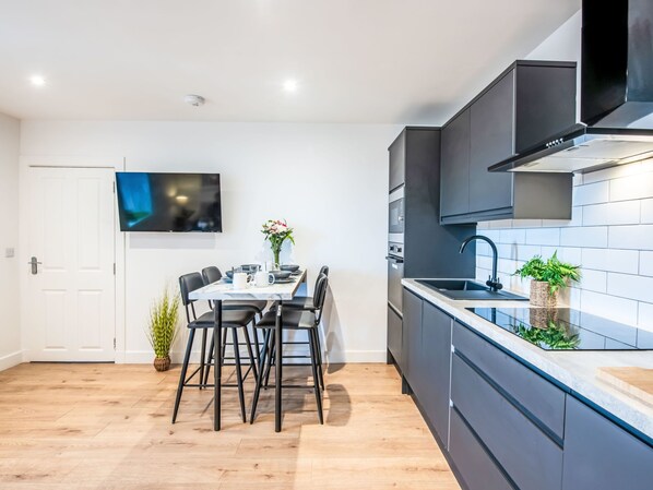 Fridge, microwave, oven, cookware/dishes/utensils