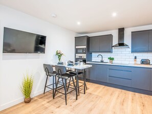 Fridge, microwave, oven, cookware/dishes/utensils