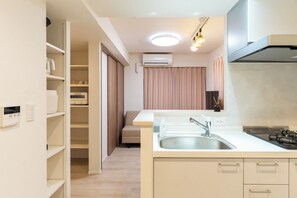 Fridge, microwave, stovetop, cookware/dishes/utensils