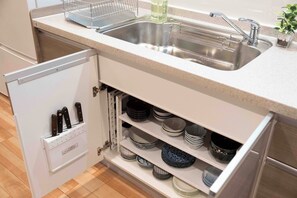 Fridge, microwave, stovetop, cookware/dishes/utensils