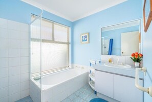 Shower, hair dryer, towels, soap