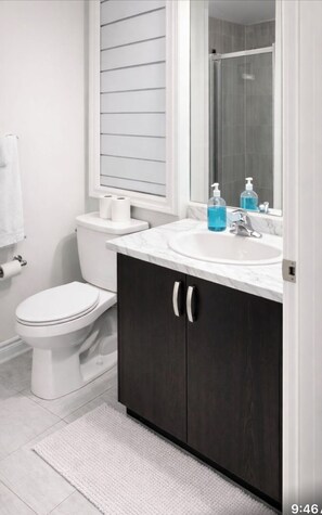 Hair dryer, towels, soap, toilet paper