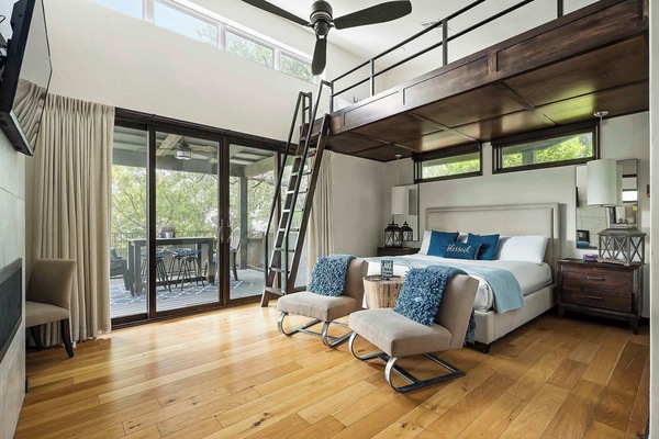 Welcome to our cozy cabin featuring a plush king bed and an inviting loft with a queen bed. Enjoy a private patio for morning coffee or evening relaxation, plus a convenient kitchenette for easy in-home meals.