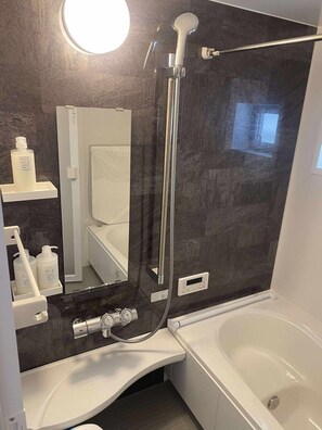 Hair dryer, bidet, towels, soap