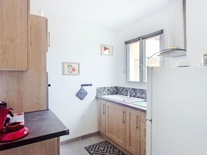 Fridge, microwave, cookware/dishes/utensils