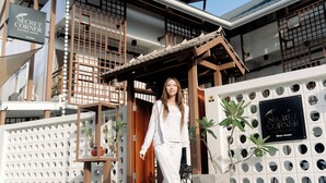 A building with a sign reading 'Secret Corner Boutique Hostel.' - Secret Corner Boutique Stay  (Chiang Rai)