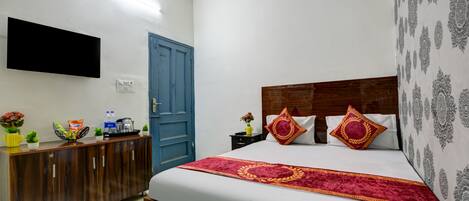 Ropa de cama hipoalergénica y espacio para trabajar con laptop