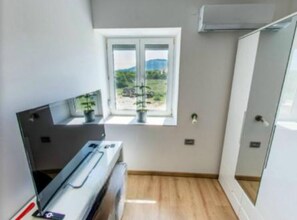 Ferienhaus (Twin Room 7) | 7 Schlafzimmer, schallisolierte Zimmer, Babybetten