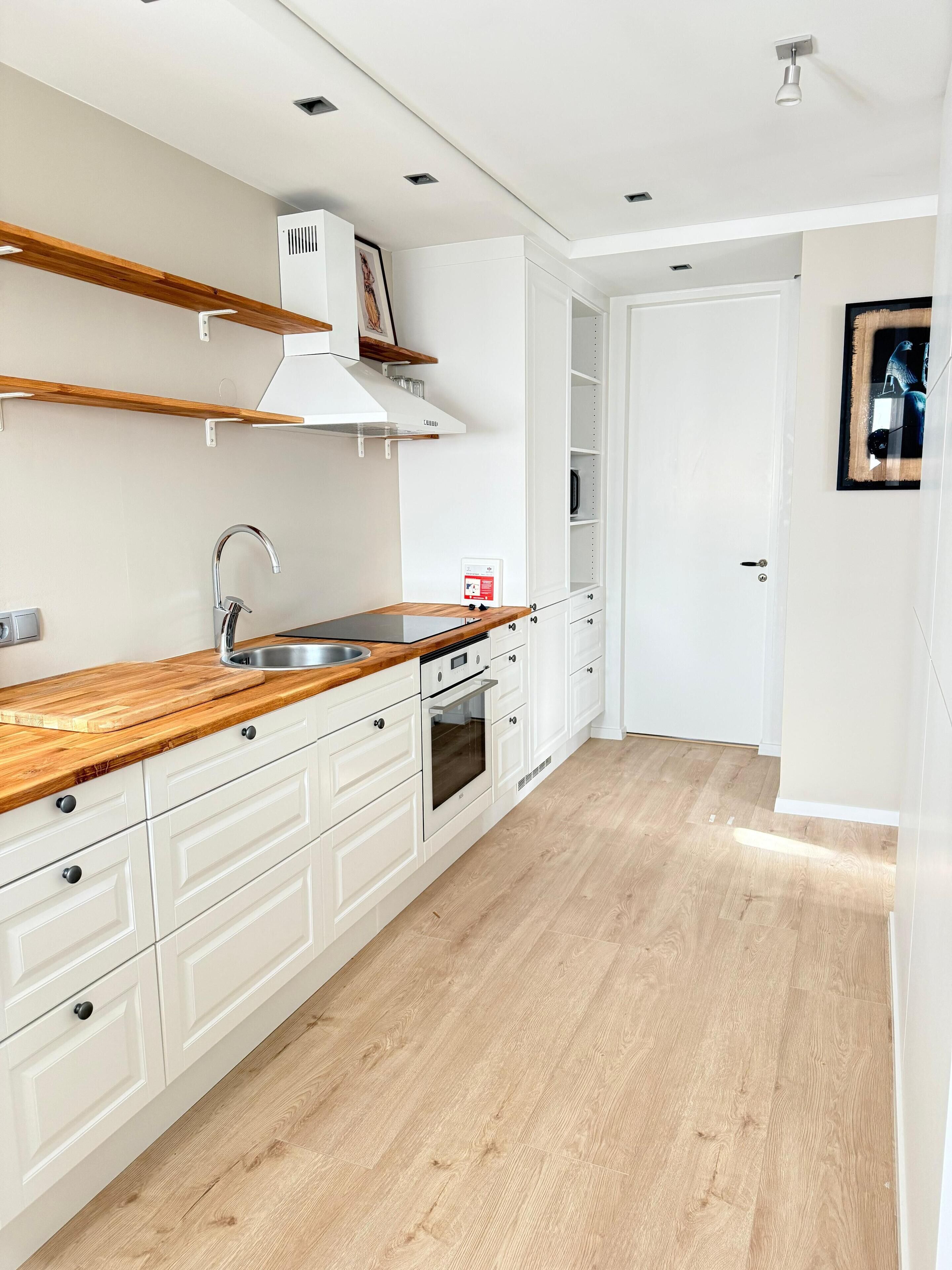 Fridge, oven, cookware/dishes/utensils