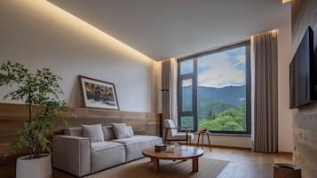 Deluxe Suite, Hill View | Desk, free WiFi