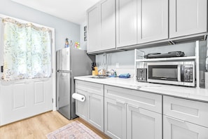 Fridge, microwave, coffee/tea maker, electric kettle