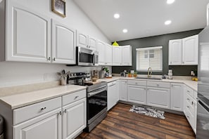 Coffee/tea maker, fridge, microwave, oven
