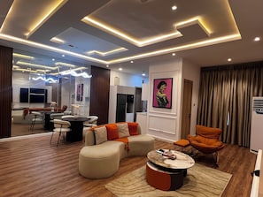 Deluxe Apartment, Balcony | Living area