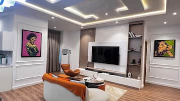 Deluxe Apartment, Balcony | Living area