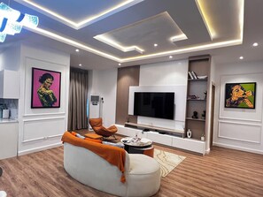 Appartement Deluxe, balcon | Coin séjour