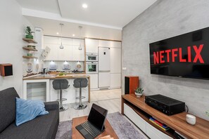 Comfort Apartment, Balcony, City View | Blackout drapes, iron/ironing board, cribs/infant beds, free WiFi